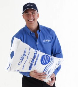 Culligan of Denison & Sherman salt delivery man holding bag